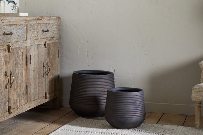 Nkuku Lmaga Metal Grooved Planter – Aged Black — plant pot from Botanic Row